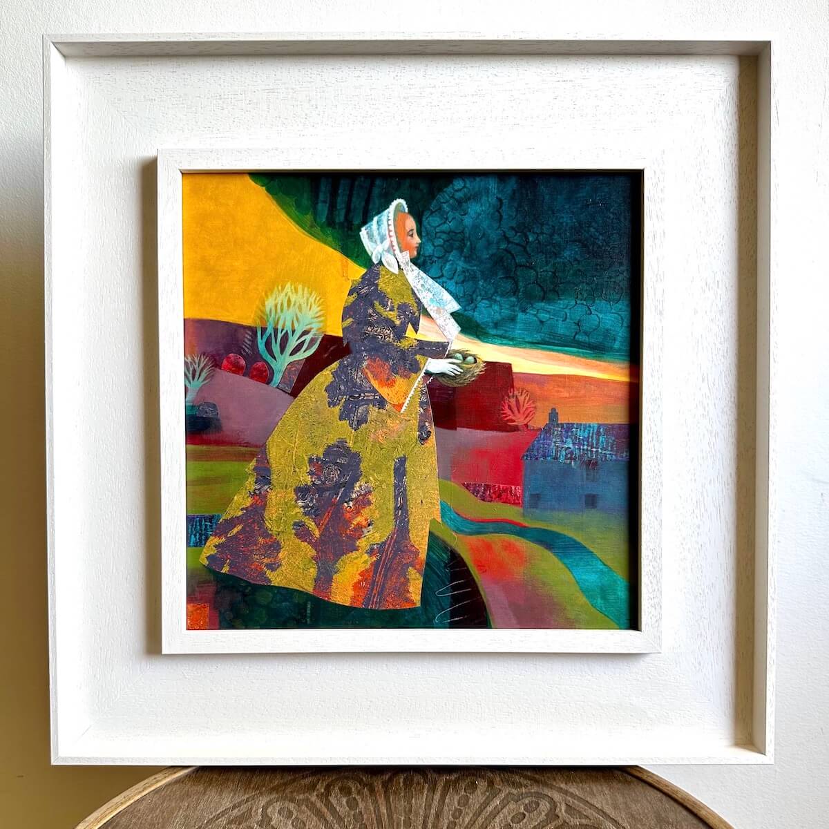 Teresa Flavin's painting One Long Ago Spring in a white frame.