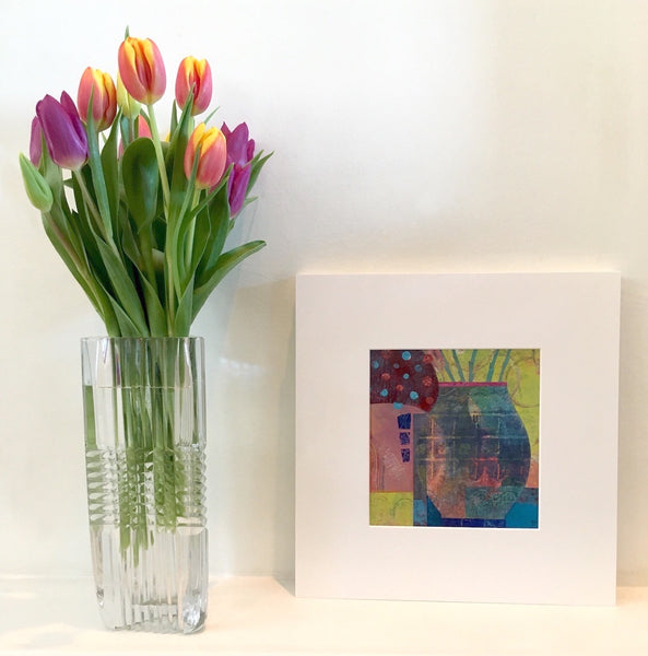 Spring Windowsill by Teresa Flavin Artist, abstract still life mixed media painting shown in white mount on shelf next to tulips in vase.